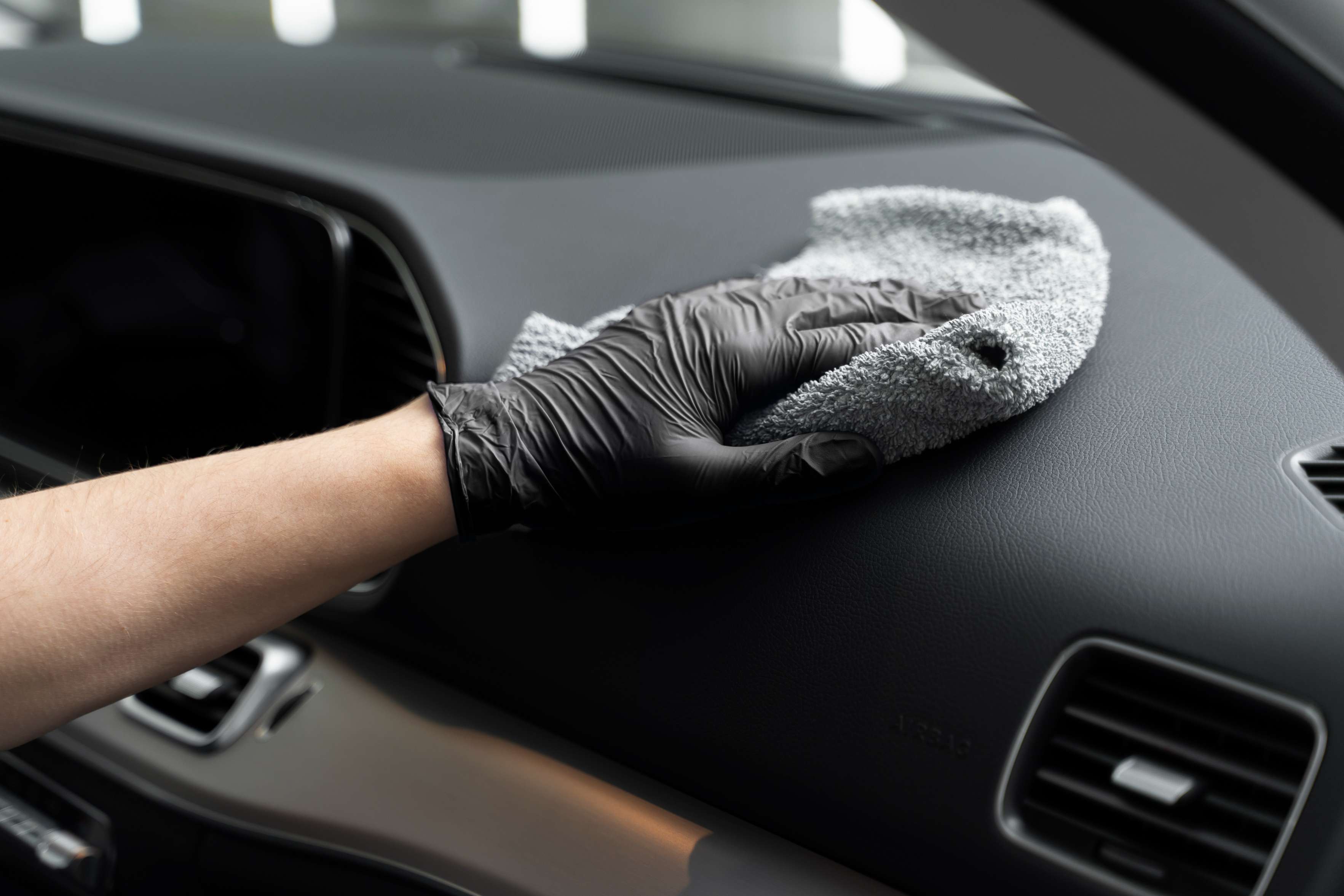 Leather car interior restoration and conditioning